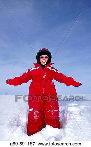 A happy 4 years old girl with a ski helmet, arms outstretched. Skorvfjallet. V? sterbotten, Sweden View Large Photo Image Stock Photo - A happy 4 years old girl with a ski helmet, arms outstretched. Skorvfjallet. V? sterbotten, Sweden. Fotosearch