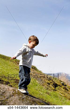 Picture - A happy toddler outdoors. Fotosearch