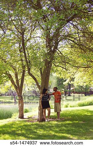 A happy, young, african-american couple outdoors View Large Photo Image Stock Photo - A happy, young, african-american couple outdoors. Fotosearch