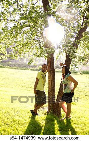 Stock Photo - A happy, young, african-american couple outdoors. Fotosearch