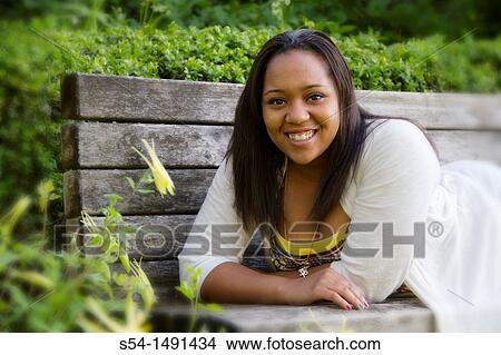 A happy young female African-American girl View Large Photo Image Picture - A happy young female African-American girl. Fotosearch