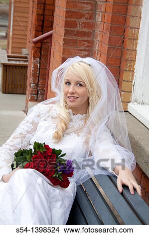 A happy young woman in a bridal gown in Rosalia, Washington, USA. View Large Photo Image Picture - A happy young woman in a bridal gown in Rosalia, Washington, USA.. Fotosearch