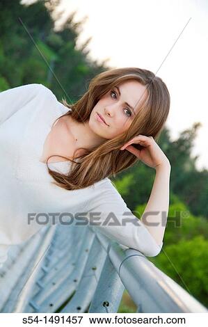 Stock Photo - A happy young woman in Spokane, Washington, USA. Fotosearch