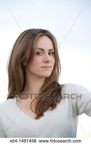 Stock Photo - A happy young woman in Spokane, Washington, USA. Fotosearch