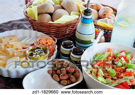A healthy full mediterranean style breakfast served at a boutique hotel View Large Photo Image Stock Image - A healthy full mediterranean style breakfast served at a boutique hotel. Fotosearch