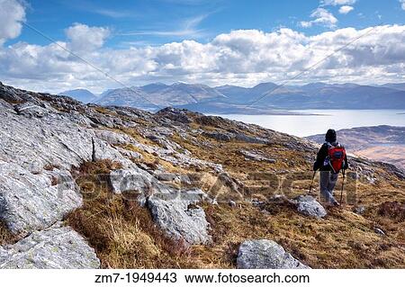 A hiker descending Sron a Garbh Choire Bhig in the Scottish Highlands. View Large Photo Image Stock Image - A hiker descending Sron a Garbh Choire Bhig in the Scottish Highlands.. Fotosearch