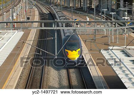 A Hitachi class 395 high speed train waits in the station at Ebbsfleet International station in England, Britain, Uk View Large Photo Image Stock Image - A Hitachi class 395 high speed train waits in the station at Ebbsfleet International station in England, Britain, Uk. Fotosearch