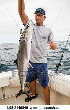 A King Mackeral caught on a Charter Fishing trip in the Gulf of Mexico off ther coast of Alabama. View Large Photo Image Stock Photography - A King Mackeral caught on a Charter Fishing trip in the Gulf of Mexico off ther coast of Alabama.. Fotosearch