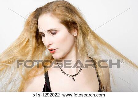 A lady with long blond hair and fair skin View Large Photo Image Stock Image - A lady with long blond hair and fair skin. Fotosearch
