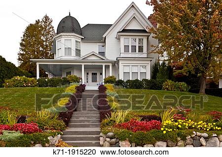 A large home of Colonial architecture in Harbor Springs, Michigan, USA View Large Photo Image Stock Image - A large home of Colonial architecture in Harbor Springs, Michigan, USA. Fotosearch