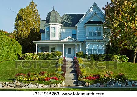 Stock Image - A large home of Colonial architecture in Harbor Springs, Michigan, USA. Fotosearch