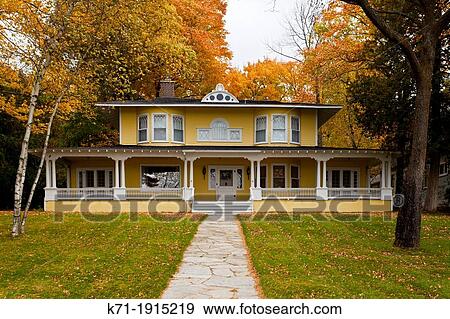 A large home of Colonial architecture in Harbor Springs, Michigan, USA View Large Photo Image Stock Photo - A large home of Colonial architecture in Harbor Springs, Michigan, USA. Fotosearch