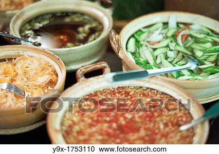 A large restaurant in Vietnam and some of the traditional Vietnamese food that is offered View Large Photo Image Stock Image - A large restaurant in Vietnam and some of the traditional Vietnamese food that is offered. Fotosearch