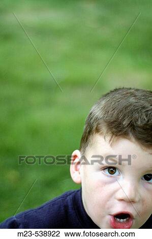 A little boy pops up to ask a question View Large Photo Image Stock Image - A little boy pops up to ask a question. Fotosearch