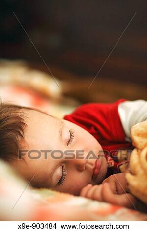 A little boy sleeping View Large Photo Image Picture - A little boy sleeping. Fotosearch