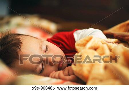A little boy sleeping View Large Photo Image Stock Photography - A little boy sleeping. Fotosearch