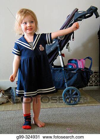 A little girl dresses in a sailor outfit to show off to her mother in Windsor. Ontario, Canada View Large Photo Image Stock Image - A little girl dresses in a sailor outfit to show off to her mother in Windsor. Ontario, Canada. Fotosearch