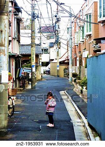 a little japanese girl alone in the street, Tokyo, Japan. View Large Photo Image Stock Image - a little japanese girl alone in the street, Tokyo, Japan.. Fotosearch