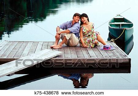 Stock Photo - a little romance on the dock. Fotosearch
