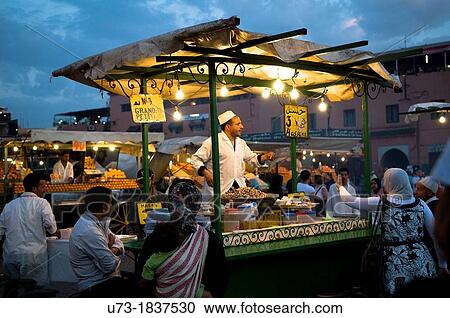 A local snails food stall at the night market in Marrakesh's Djema el fna sq. View Large Photo Image Stock Image - A local snails food stall at the night market in Marrakesh's Djema el fna sq.. Fotosearch
