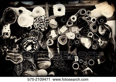 A lot of fabric rolls in a warehouse, London, England, UK View Large Photo Image Stock Image - A lot of fabric rolls in a warehouse, London, England, UK. Fotosearch