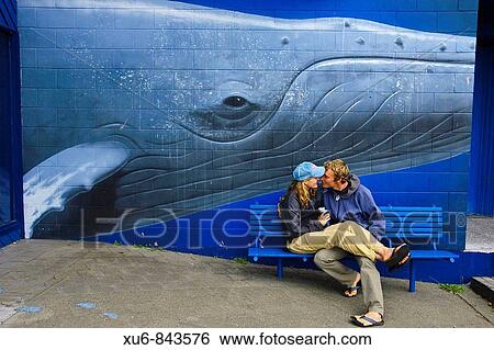 A loving couple and a whale mural Kaikoura, New Zealand View Large Photo Image Stock Photograph - A loving couple and a whale mural Kaikoura, New Zealand. Fotosearch