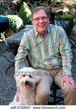 A man and his labradoodle. View Large Photo Image Stock Image - A man and his labradoodle.. Fotosearch