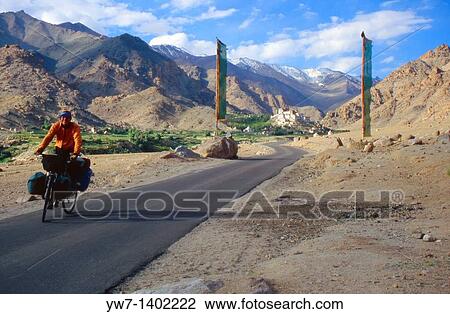 A man cycling near Likir town Likir is a small town located in Ladakh, which is part of the state of Jammu and Kashmir in India View Large Photo Image Stock Image - A man cycling near Likir town Likir is a small town located in Ladakh, which is part of the state of Jammu and Kashmir in India. Fotosearch