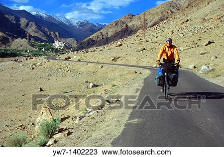 A man cycling near Likir town Likir is a small town located in Ladakh, which is part of the state of Jammu and Kashmir in India View Large Photo Image Stock Image - A man cycling near Likir town Likir is a small town located in Ladakh, which is part of the state of Jammu and Kashmir in India. Fotosearch