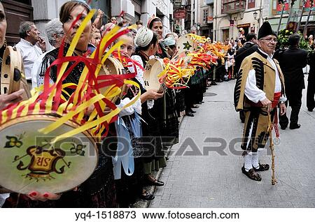 A man dressed in traditional costume of Llanes, with women who play the tambourine during the arrival of the procession to the chapel of San Roque, Llanes, Asturias, Spain. View Large Photo Image Stock Image - A man dressed in traditional costume of Llanes, with women who play the tambourine during the arrival of the procession to the chapel of San Roque, Llanes, Asturias, Spain.. Fotosearch