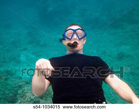 A man snorkeling at Hanauma Bay, Oahu, Hawaii View Large Photo Image Stock Photography - A man snorkeling at Hanauma Bay, Oahu, Hawaii. Fotosearch