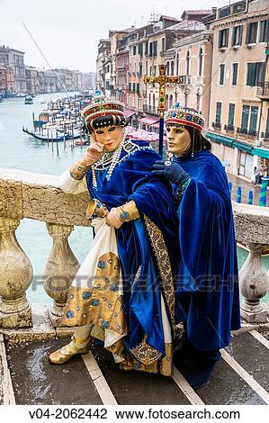 A masked couple at the carnival in Venice, Italy, Europe View Large Photo Image Stock Image - A masked couple at the carnival in Venice, Italy, Europe. Fotosearch