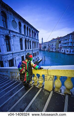 A masked harlequin at the carnival in Venice, Italy, Europe View Large Photo Image Picture - A masked harlequin at the carnival in Venice, Italy, Europe. Fotosearch
