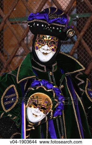 A masked harlequin at the carnival in Venice, Italy, Europe View Large Photo Image Picture - A masked harlequin at the carnival in Venice, Italy, Europe. Fotosearch