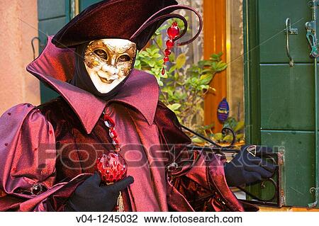 A masked harlequin at the carnival in Venice, Italy, Europe View Large Photo Image Stock Image - A masked harlequin at the carnival in Venice, Italy, Europe. Fotosearch