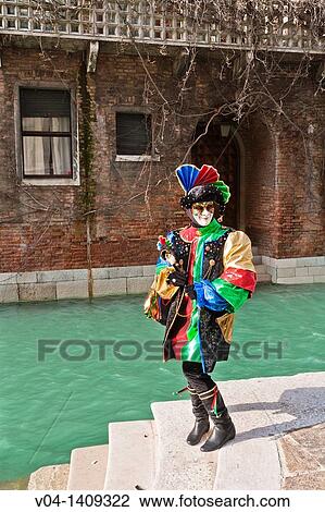 A masked harlequin at the carnival in Venice, Italy, Europe View Large Photo Image Stock Image - A masked harlequin at the carnival in Venice, Italy, Europe. Fotosearch
