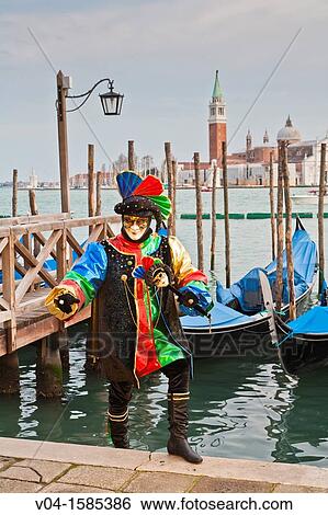 A masked harlequin at the carnival in Venice, Italy, Europe View Large Photo Image Stock Photograph - A masked harlequin at the carnival in Venice, Italy, Europe. Fotosearch