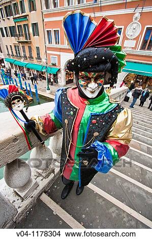 A masked man at the carnival in Venice, Italy, Europe View Large Photo Image Picture - A masked man at the carnival in Venice, Italy, Europe. Fotosearch