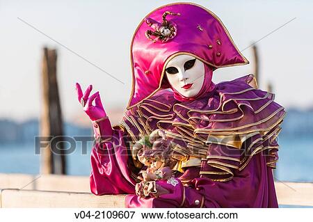 Stock Photo - A masked person at the carnival in Venice, Italy, Europe. Fotosearch