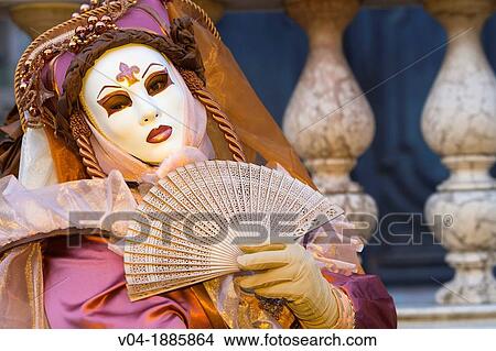 A masked woman at the carnival in Venice, Italy, Europe View Large Photo Image Picture - A masked woman at the carnival in Venice, Italy, Europe. Fotosearch