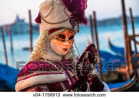 A masked woman at the carnival in Venice, Italy, Europe View Large Photo Image Stock Image - A masked woman at the carnival in Venice, Italy, Europe. Fotosearch