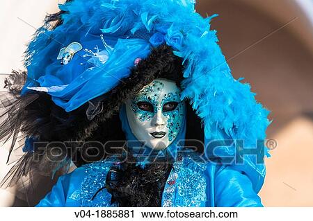 Stock Image - A masked woman at the carnival in Venice, Italy, Europe. Fotosearch