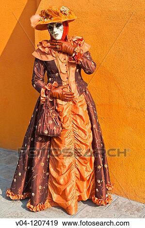 Stock Photo - A masked woman at the carnival in Venice, Italy, Europe. Fotosearch