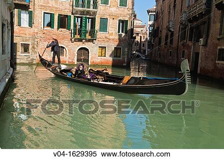 A masked woman during carnival in a gondola, Venice, Italy, Europe View Large Photo Image Stock Photography - A masked woman during carnival in a gondola, Venice, Italy, Europe. Fotosearch