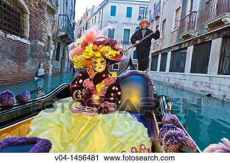 A masked woman in a gondola at the carnival in Venice, Italy, Europe View Large Photo Image Stock Image - A masked woman in a gondola at the carnival in Venice, Italy, Europe. Fotosearch