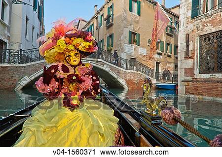 A masked woman in a gondola at the carnival in Venice, Italy, Europe View Large Photo Image Stock Image - A masked woman in a gondola at the carnival in Venice, Italy, Europe. Fotosearch