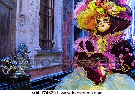 A masked woman in a gondola at the carnival in Venice, Italy, Europe View Large Photo Image Stock Image - A masked woman in a gondola at the carnival in Venice, Italy, Europe. Fotosearch