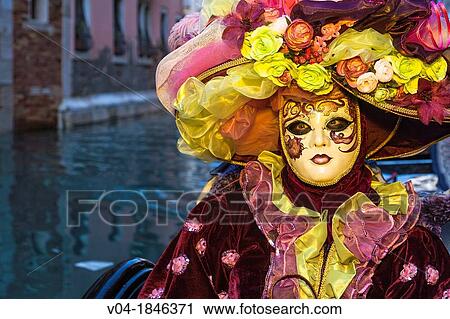 A masked woman in a gondola at the carnival in Venice, Italy, Europe View Large Photo Image Stock Image - A masked woman in a gondola at the carnival in Venice, Italy, Europe. Fotosearch