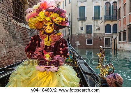 A masked woman in a gondola at the carnival in Venice, Italy, Europe View Large Photo Image Stock Image - A masked woman in a gondola at the carnival in Venice, Italy, Europe. Fotosearch