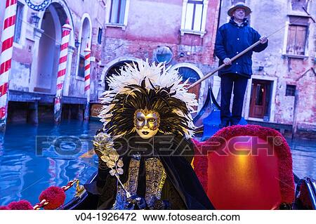 A masked woman in a gondola at the carnival in Venice, Italy, Europe View Large Photo Image Stock Image - A masked woman in a gondola at the carnival in Venice, Italy, Europe. Fotosearch